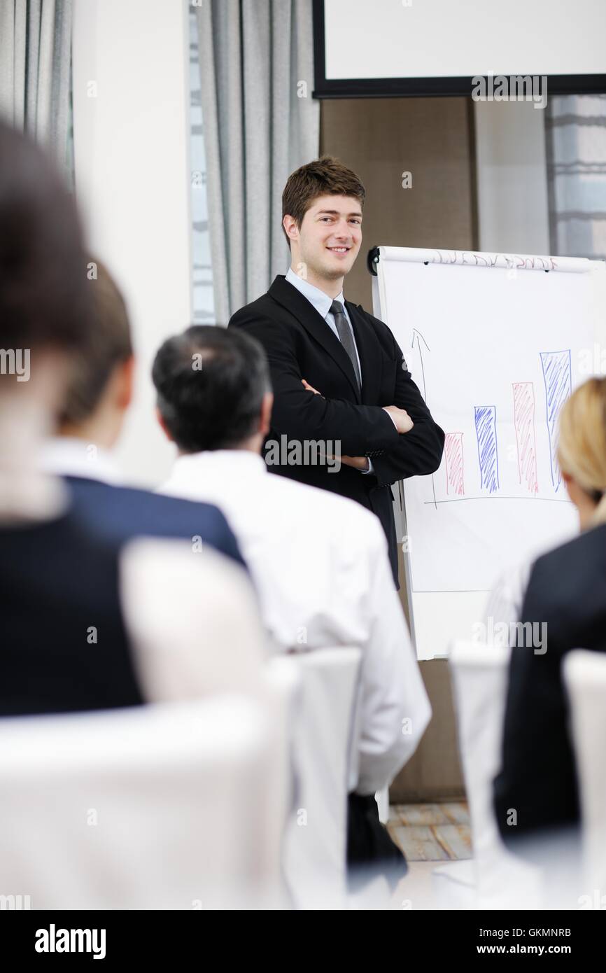 Young business man giving a presentation on conference Stock Photo - Alamy