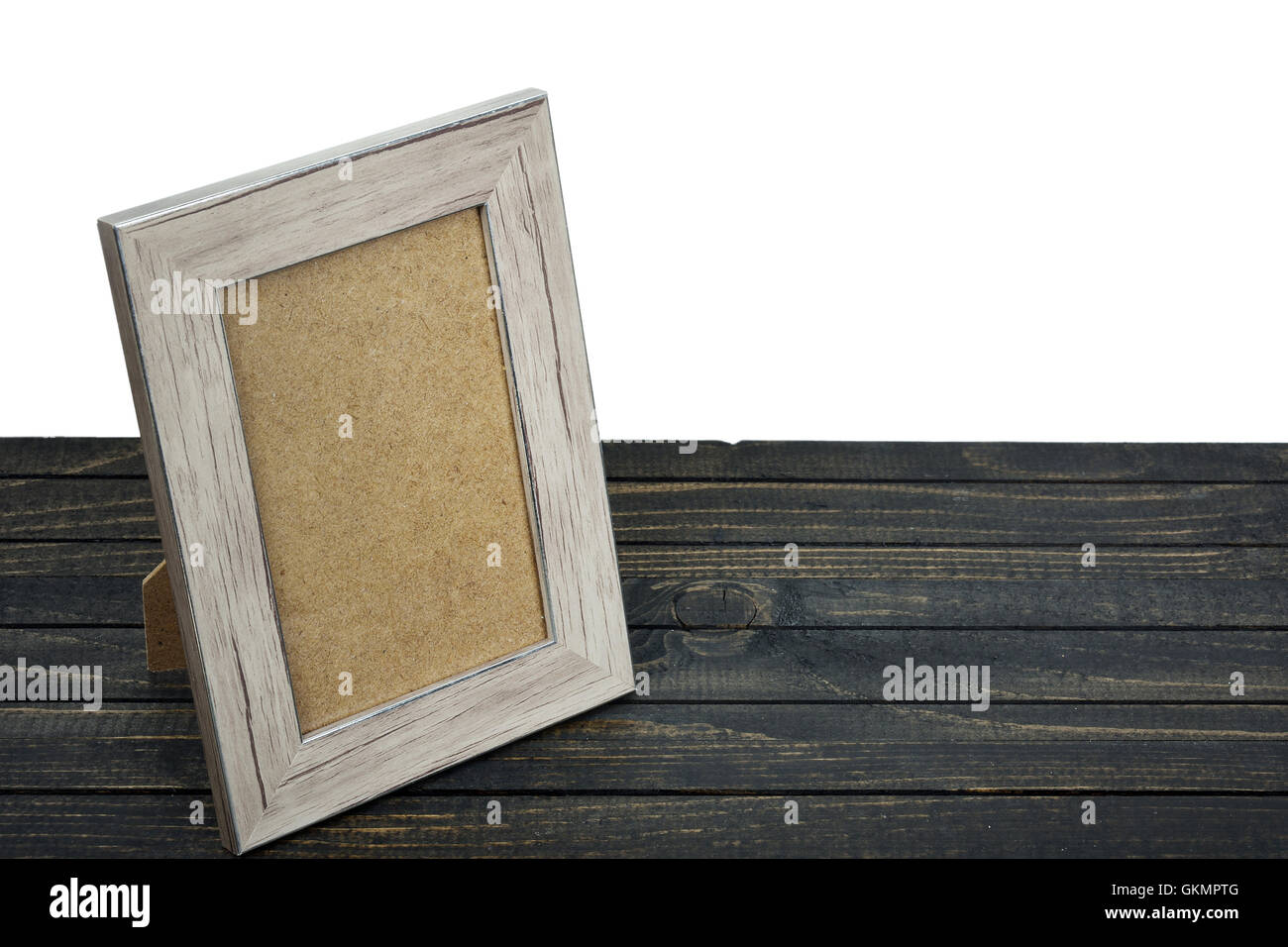 Photo frame on wooden table Stock Photo