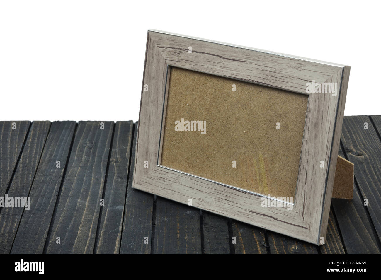 Photo frame on wooden table Stock Photo