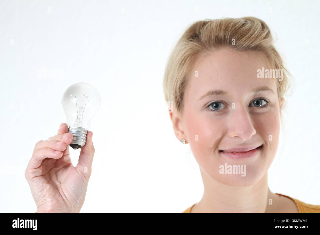 girl with light bulb Stock Photo Alamy