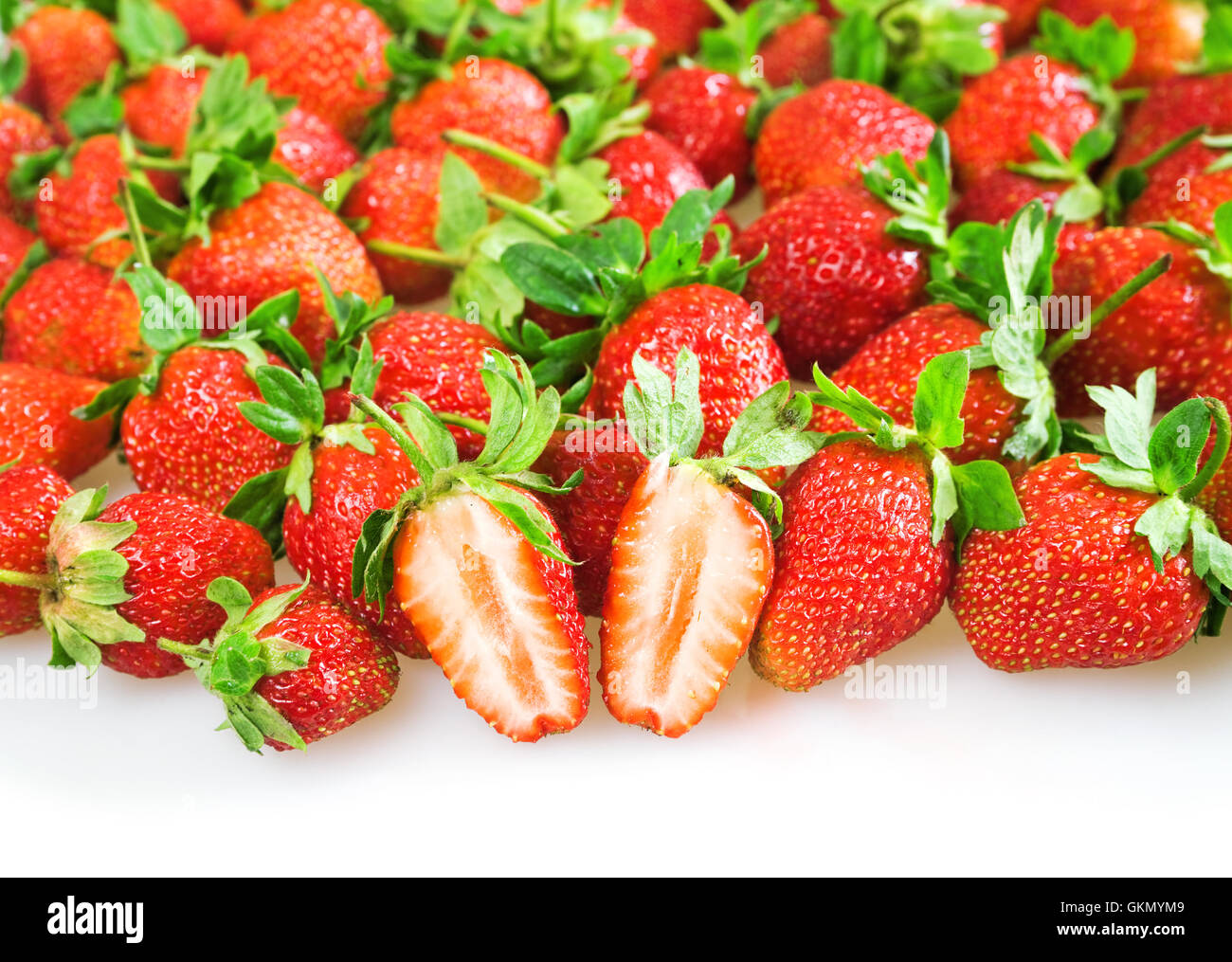 ripe juicy red strawberry on a white background Stock Photo - Alamy