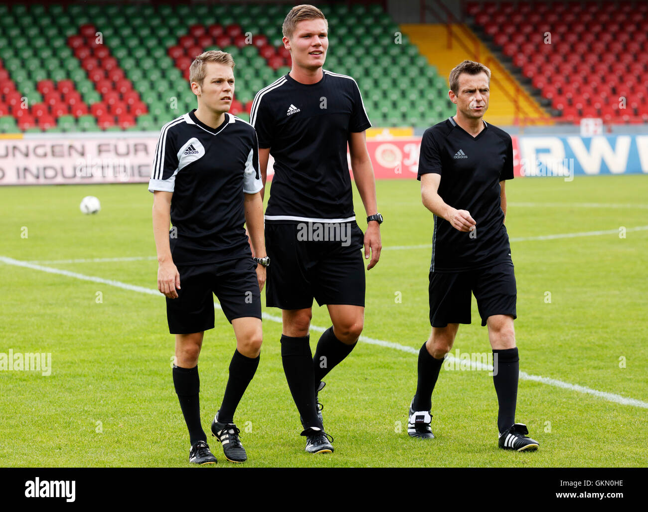 sports, football, Regional League West, 2016/2017, Rot Weiss Oberhausen versus FC Schalke 04 U23 1:1, match officials, f.l.t.r. assistant Dr. Michael Negri, referee Florian Exner, assistant Marcel Pelgrim Stock Photo