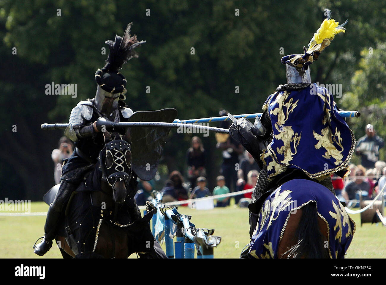 Will Wanless (right) as Marquis De Lyons and Daniel Fowler-Prime as Black Knight from The Knights of Arkley joust on the south lawn of Blenheim Palace in Oxfordshire. Stock Photo