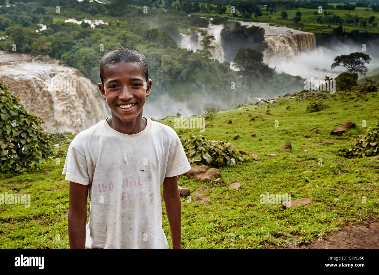 BLUE NILE FALLS, ETHIOPIA - SEPT 13, 2013: Portrait of young local boy offered himself to be a tour guide, Tis Issat Or Tissisat Stock Photo