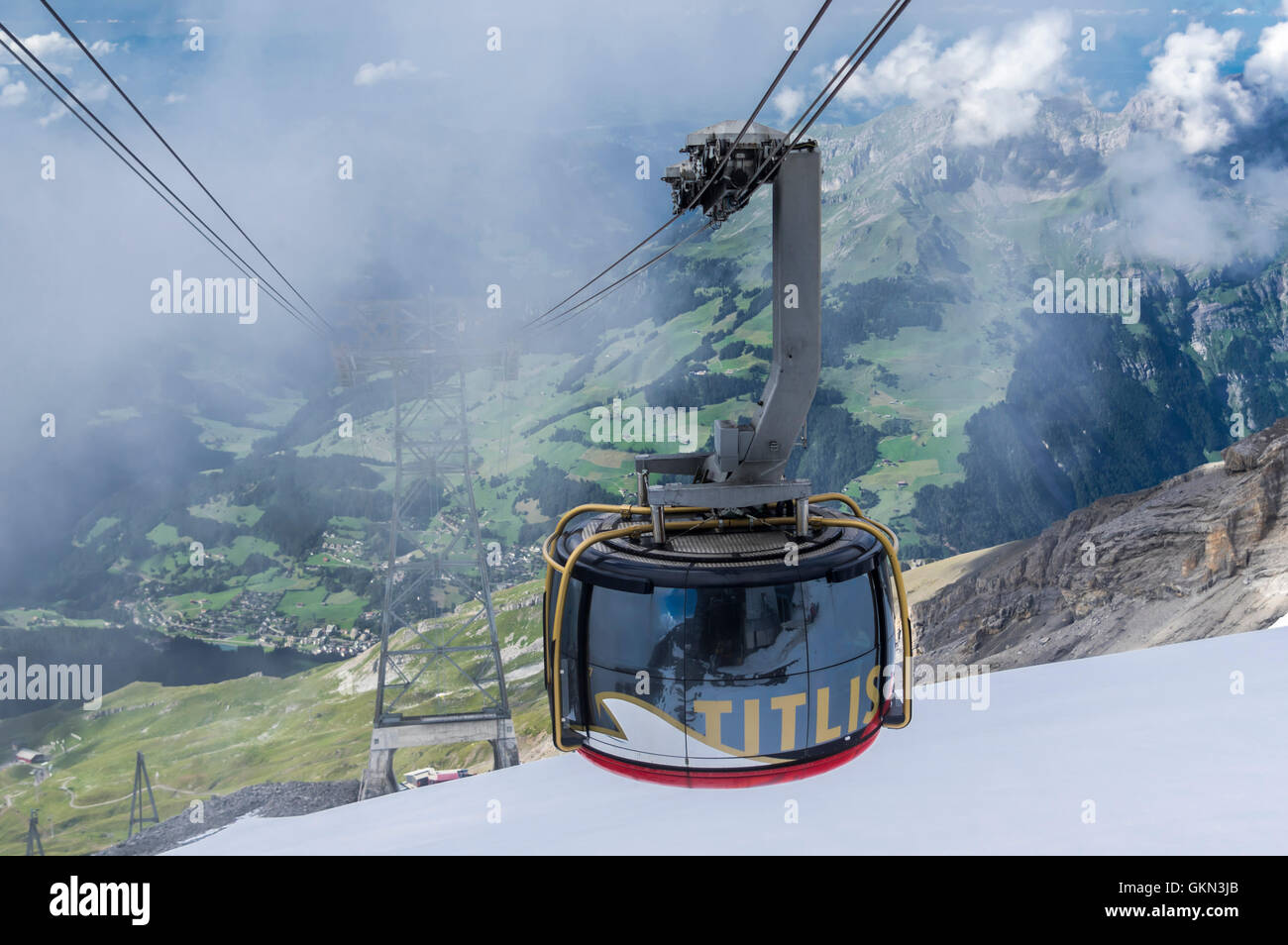 Revolving cable car 'Titlis Rotair' approaching the top station on Klein Titlis. Engelberg, Obwalden, Switzerland. Stock Photo