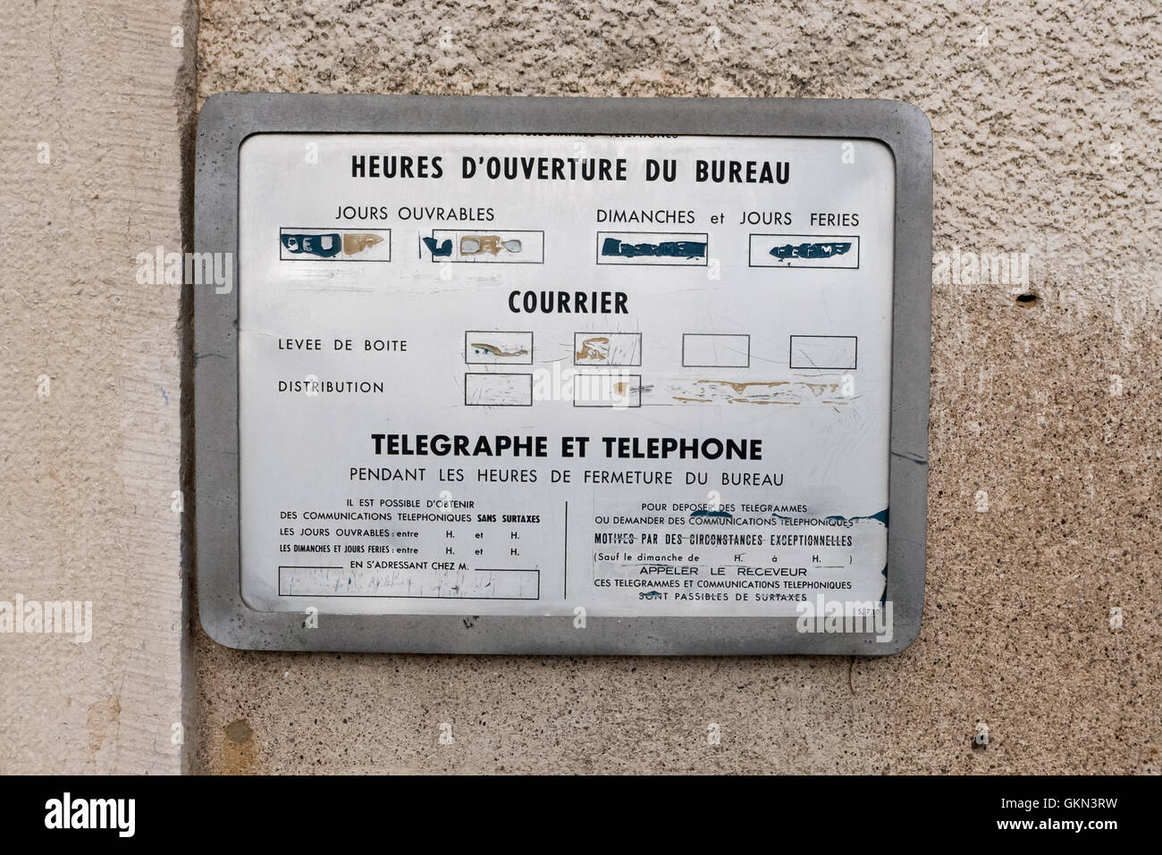 Standard opening hours sign outside a French Post Office Stock Photo - Alamy