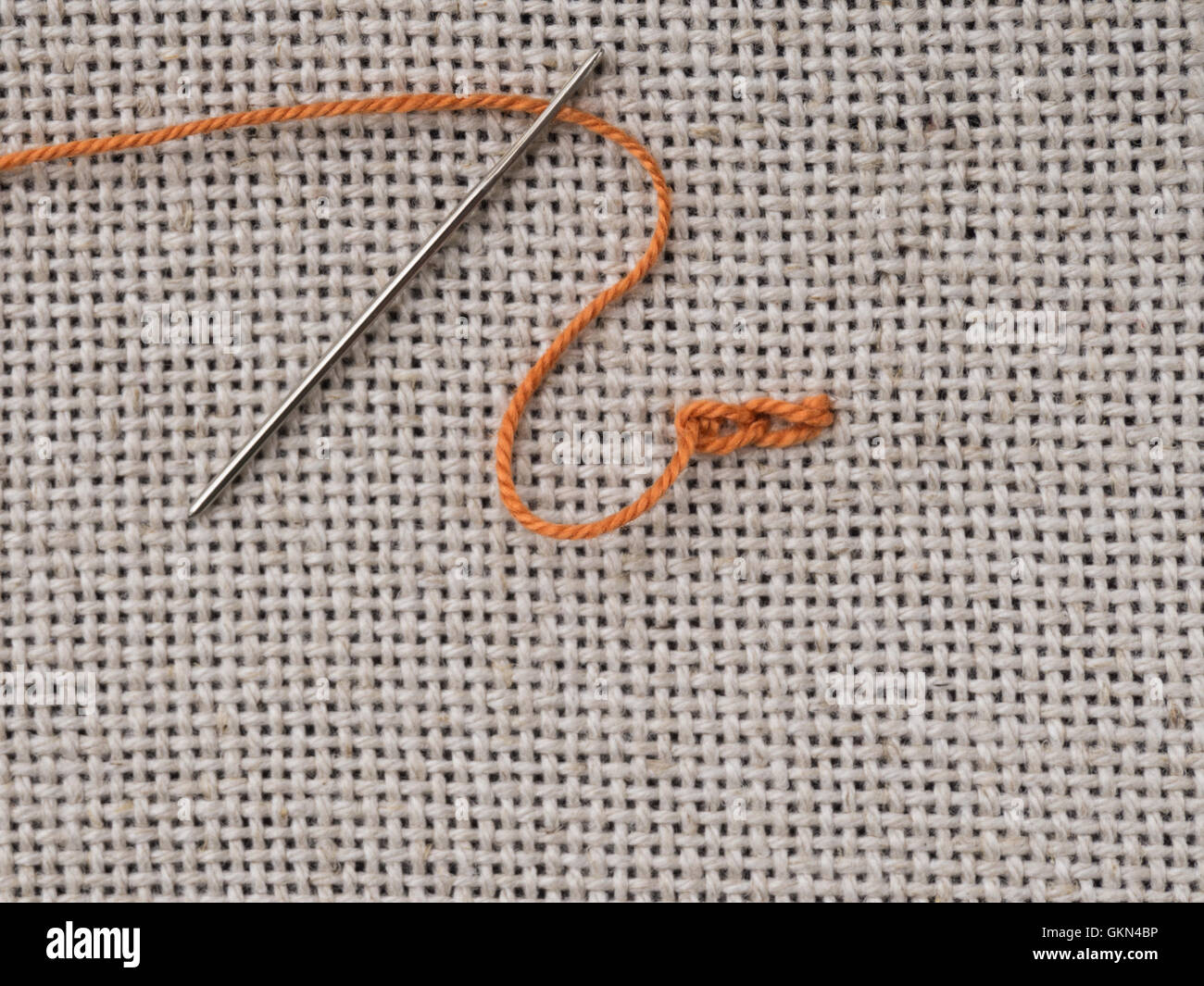Some embroidery stitches on the canvas with a needle Stock Photo Alamy