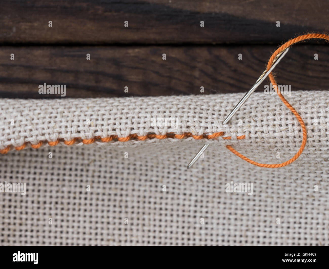 Some embroidery stitches on the canvas with a needle Stock Photo Alamy