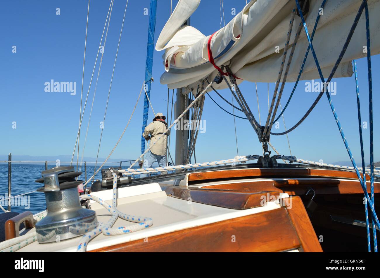 Man raising the sail Stock Photo