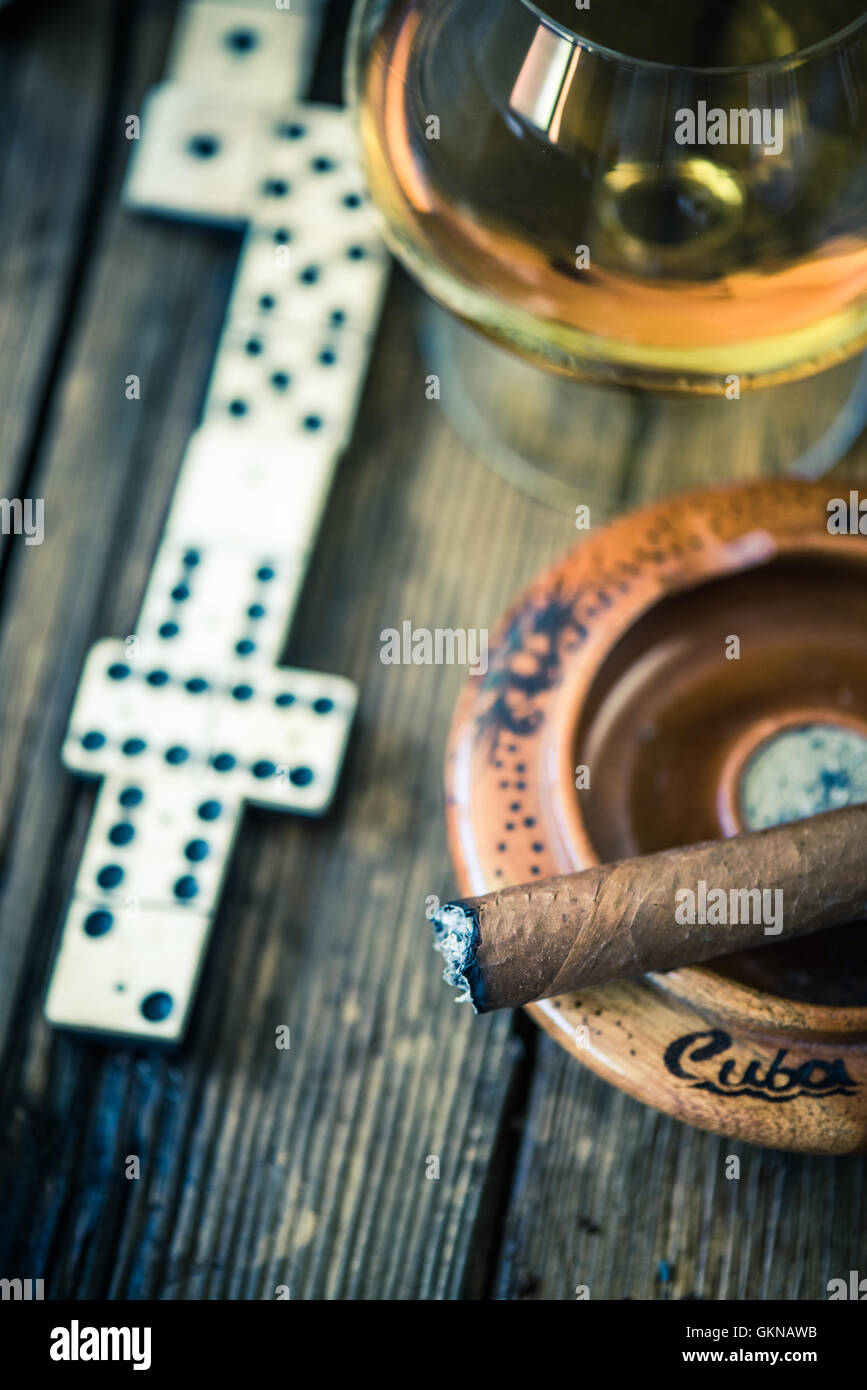 smoking cuban cigar while play domino game Stock Photo Alamy