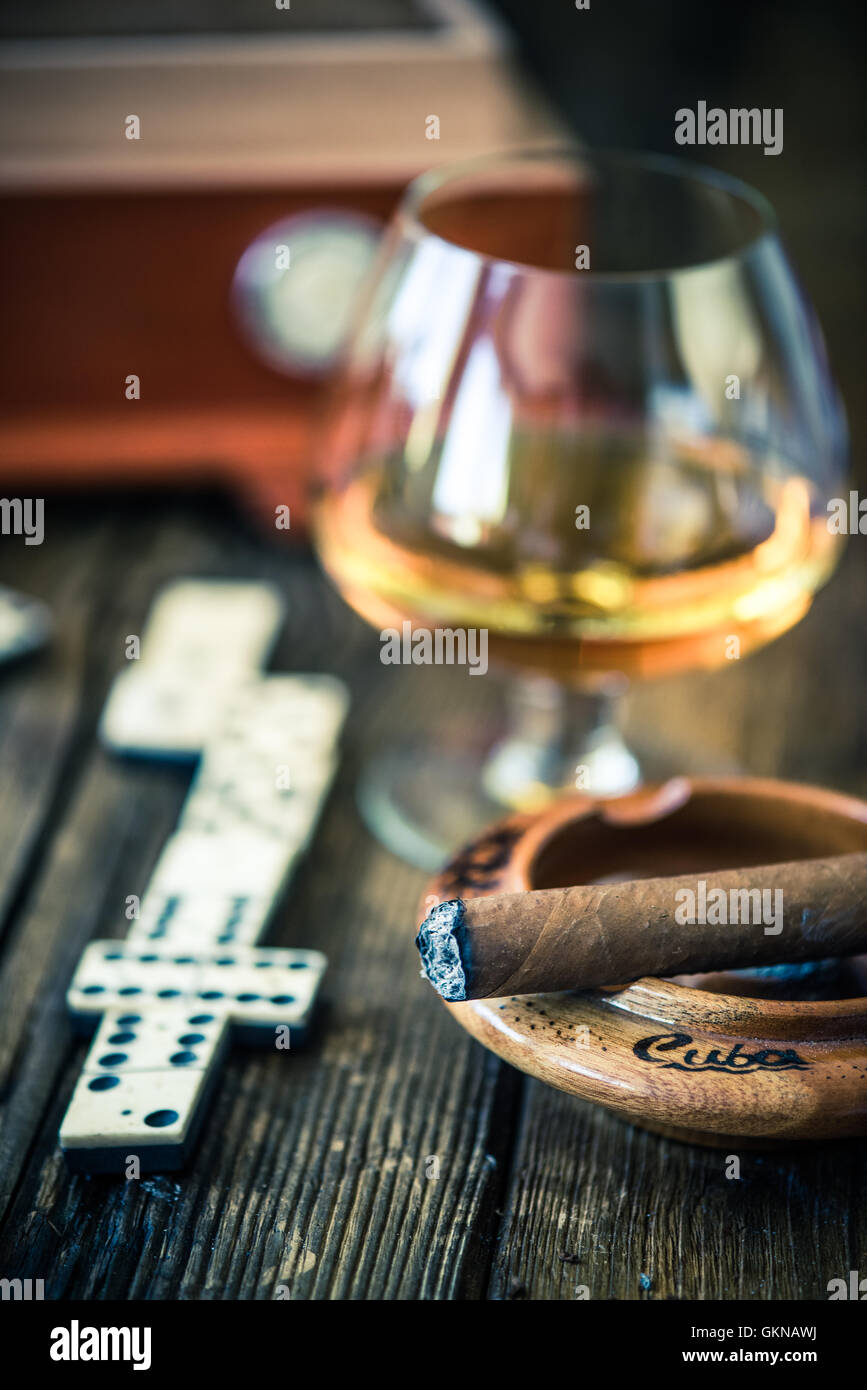 smoking cuban cigar while play domino game Stock Photo Alamy