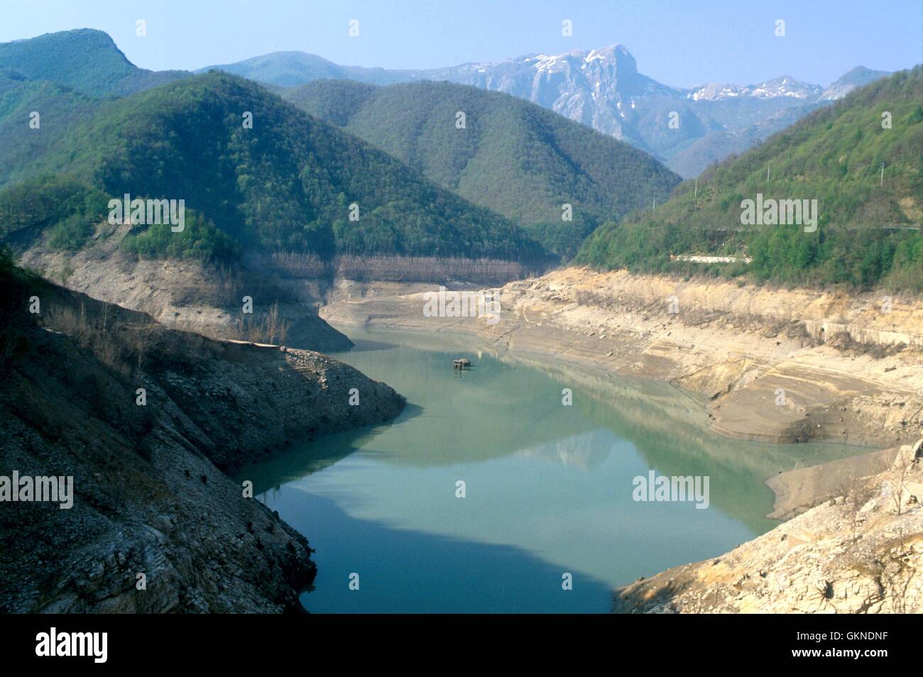 The ancient village Fabbriche di Careggine (Garfagnana Valley, Tuscany, Italy), submerged by the waters of the lake Vagli, resurfaces each ten years in occasion of maintenance to the dam that blocks the lake. Stock Photo