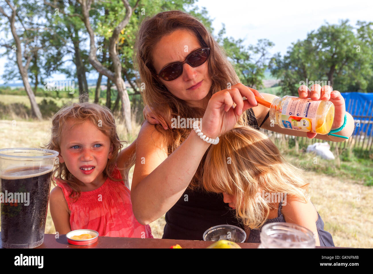 Mother with her two daughters, and Children's Snacks, Czech Republic Stock Photo