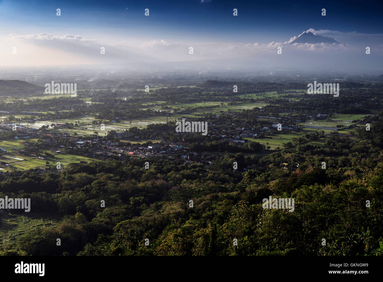 Aerial view of Yogyakarta with Merapi volcano from Bukit Bintang, Jawa, Indonesia Stock Photo