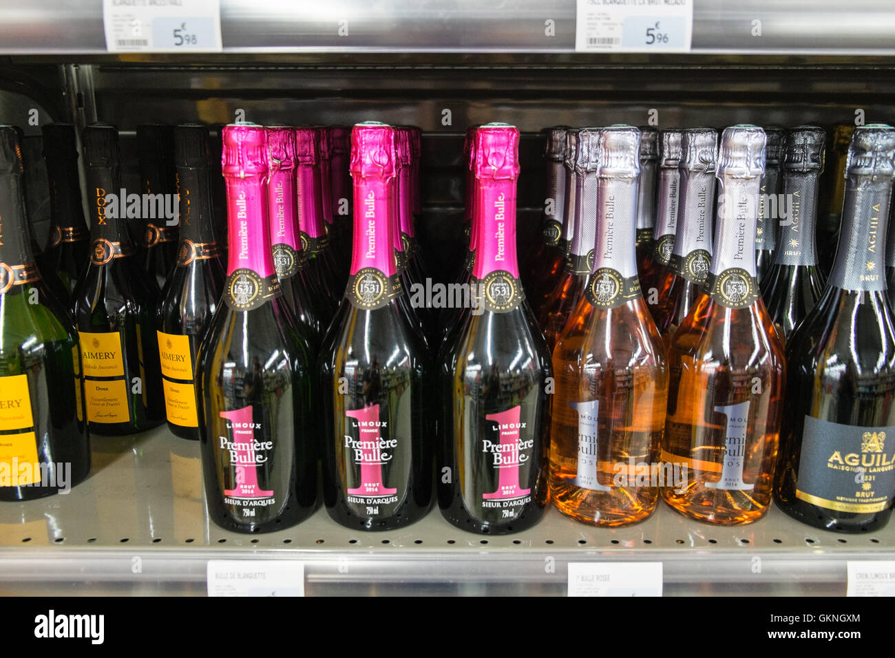 Huge selection of plastic bottled mineral water for sale at supermarket