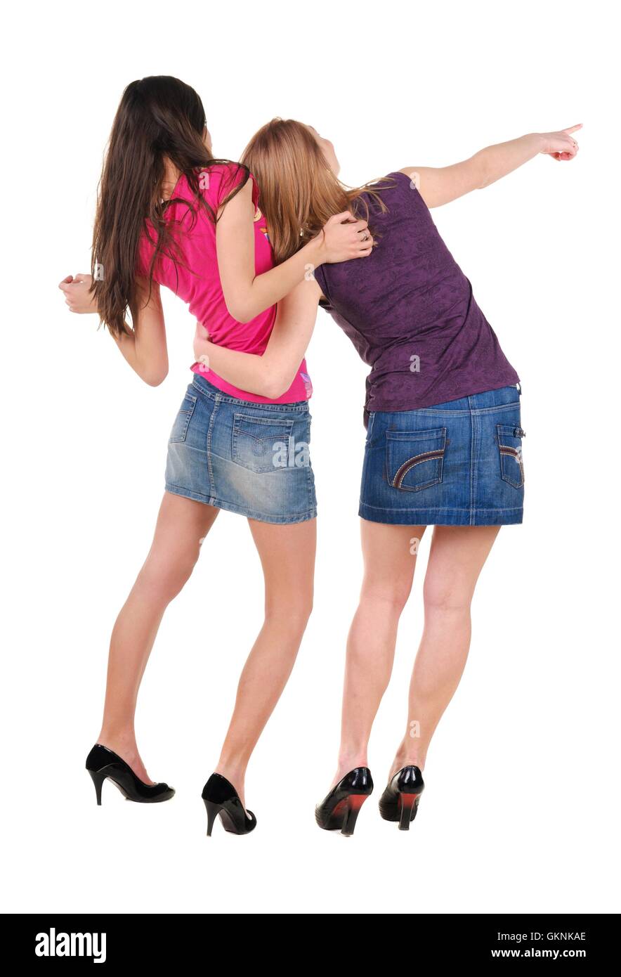 Two young women rear view Stock Photo - Alamy