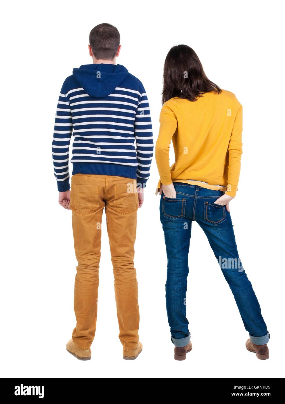 Back view of young couple hug and look into the distance Stock Photo ...