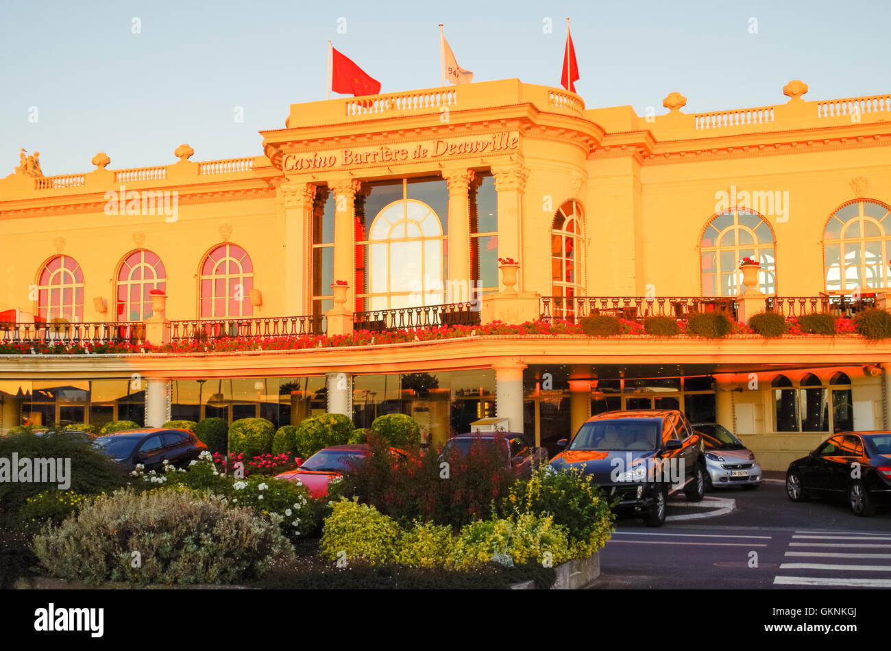 Facade of the Casino Barrière in Deauville in the warm light of the golden hour Stock Photo