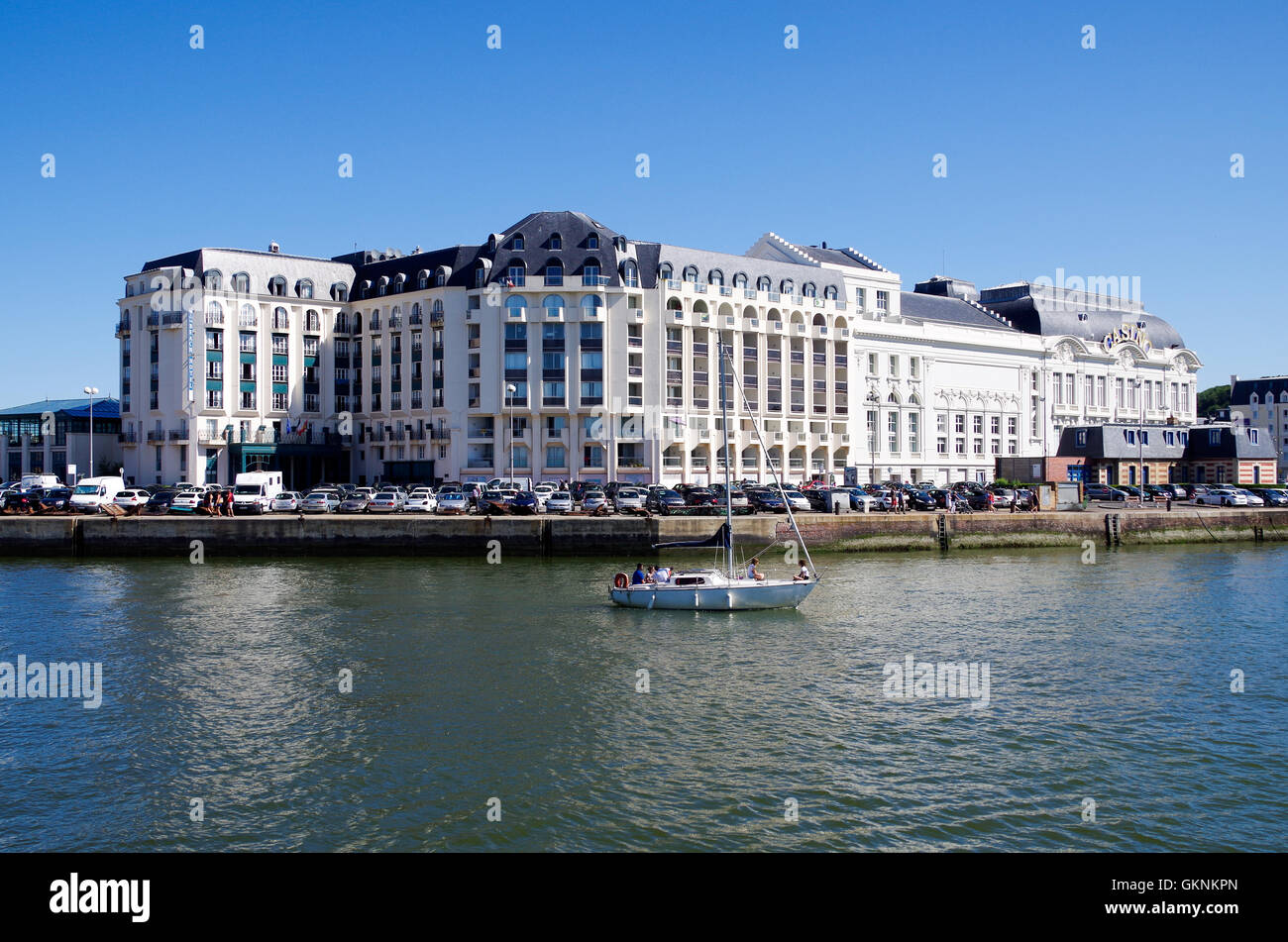 Beach hotel and Casino Barrière of Trouville, seen from the other side of the Touques river in France Stock Photo