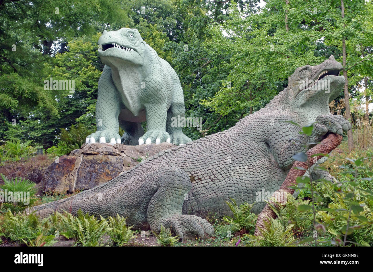 Dinosaur figures in Crystal Palace Park, South London Stock Photo