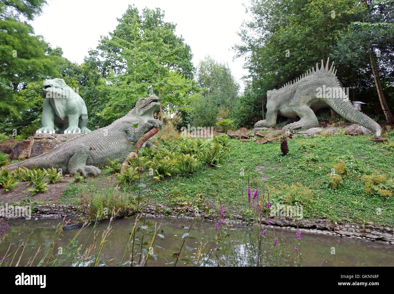 Dinosaur figures in Crystal Palace Park, South London Stock Photo