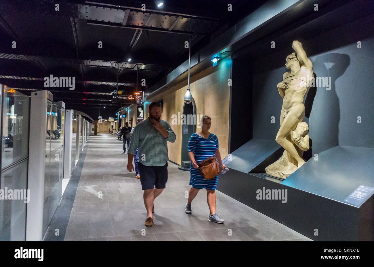 Paris, France, Inside Metro, Underground, Subway Station, Louvre-Rivoli with Michelangelo Sculpture Art Work on DIsplay on Quay, French metro RATP, louvre chef d’oeuvre, line 1 tube train busy Stock Photo