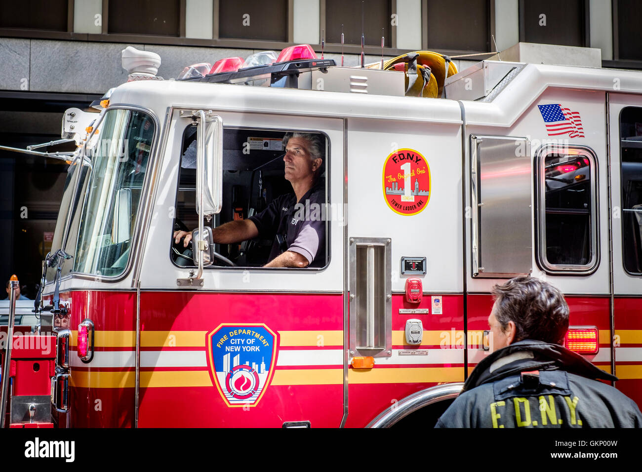 A Fire Department Truck is reversed down the street in New York Stock Photo