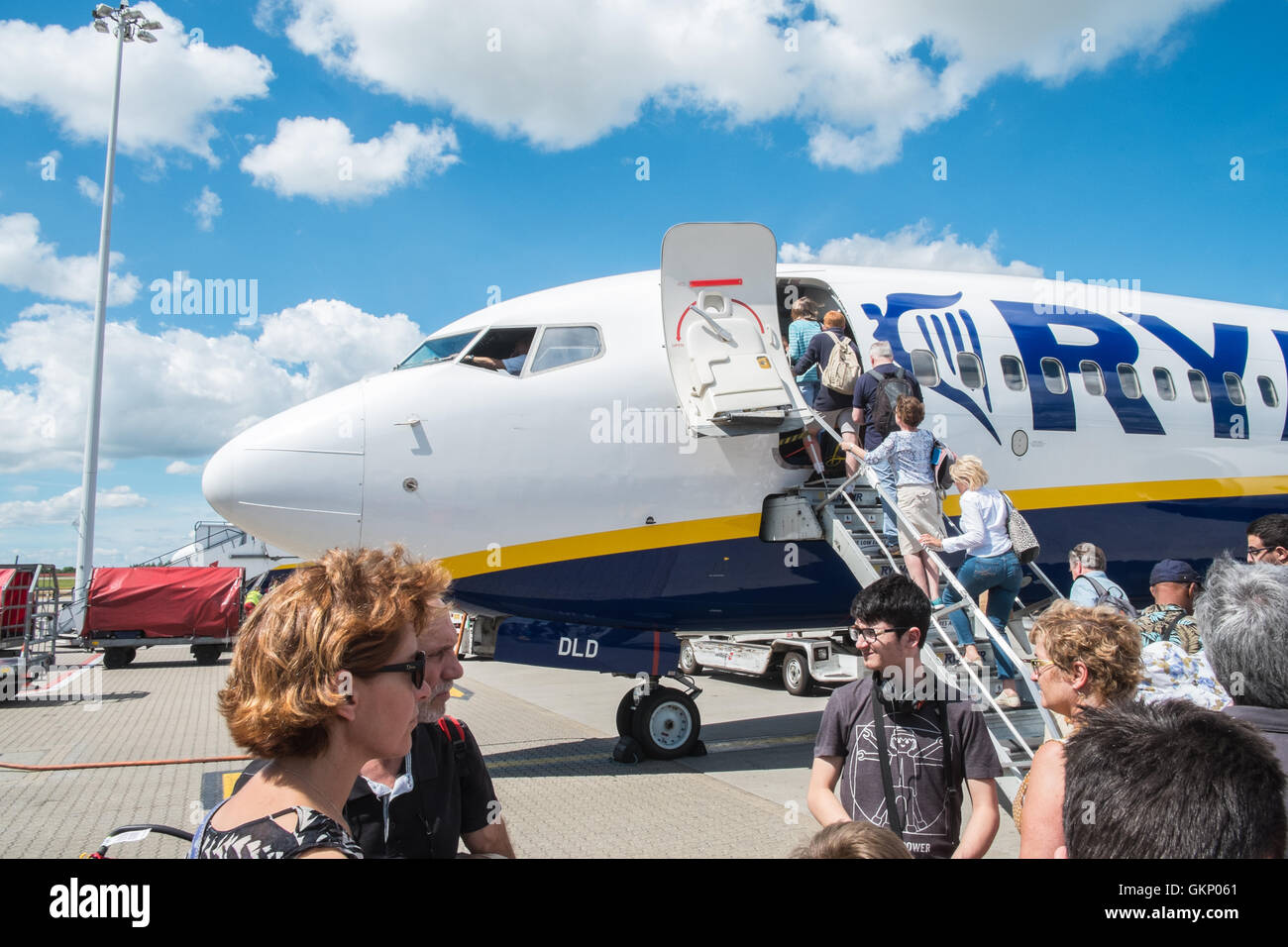 Passengers boarding Ryanair plane at Stansted Airport for flight to Carcassonne,South of France. Stock Photo