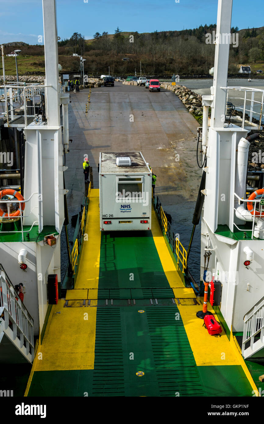 NHS medical unit disembarking from the Small Isles ferry 'Lochnevis' at the Isle of Eigg, Inner Hebrides, Scotland, UK Stock Photo