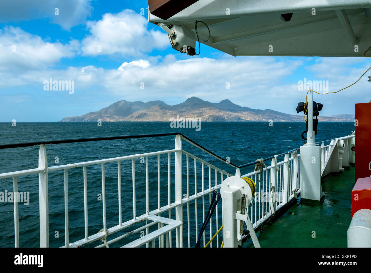 On board the Small Isles ferry 'Lochnevis' approaching the Isle of Rum, Inner Hebrides, Scotland, UK Stock Photo