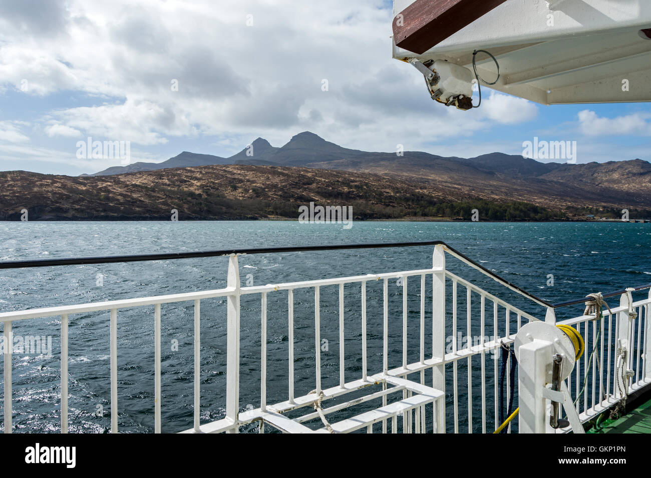 On board the Small Isles ferry 'Lochnevis' approaching the Isle of Rum, Inner Hebrides, Scotland, UK Stock Photo
