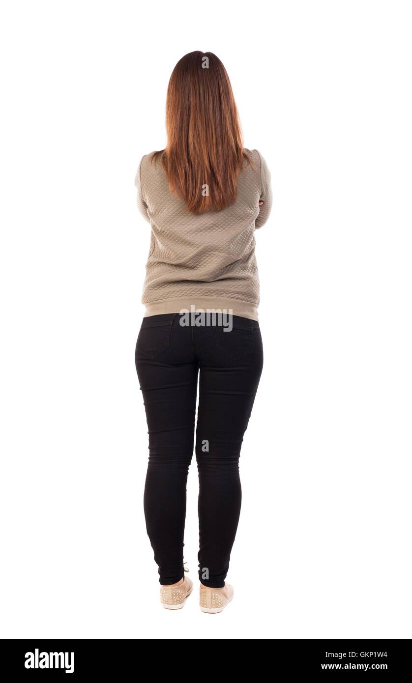back view of standing young beautiful woman in jeans Stock Photo - Alamy