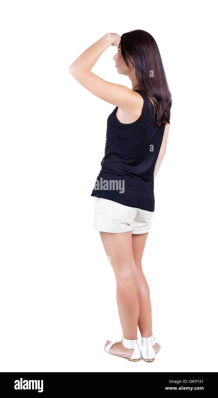 back view of standing young beautiful brunette woman Stock Photo - Alamy