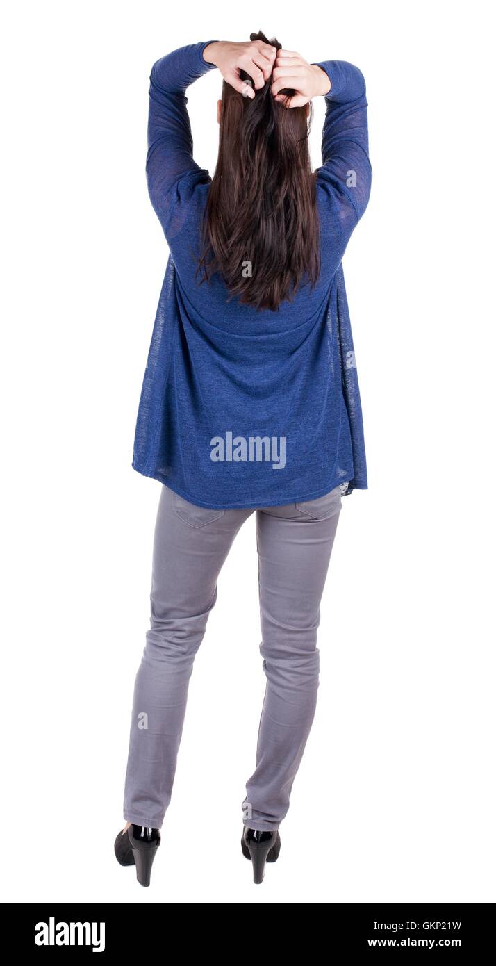 back view of standing young beautiful brunette woman Stock Photo - Alamy
