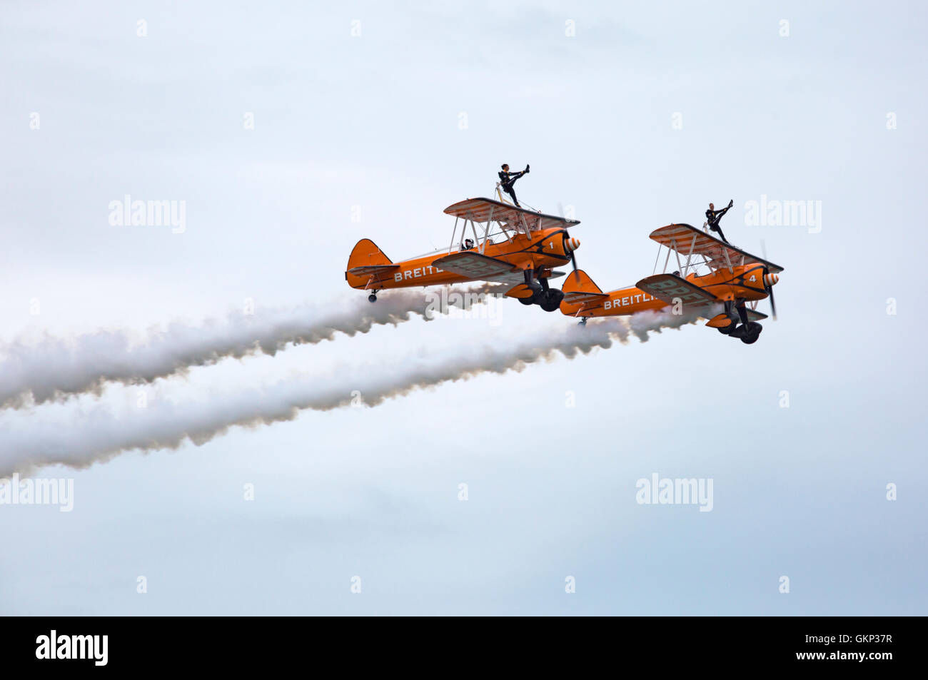 Bournemouth, UK. 21 Aug, 2016. Breitling wingwalkers wing walkers perform at the Bournemouth Air Festival, Bournemouth, UK. The Breitling wingwalkers  have since become the AeroSuperBatics Wingwalkers.  Credit:  Carolyn Jenkins/Alamy Live News Stock Photo