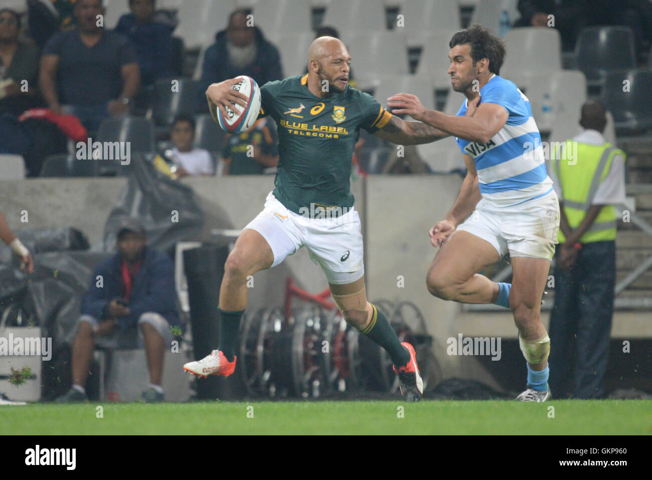 Nelspruit, South Africa. 20 August 2016. The South African National Rugby team in action against the Pumas at Mbombela Stadium. Lionel Mapoe fending off Matias Orlando of Argentina Stock Photo