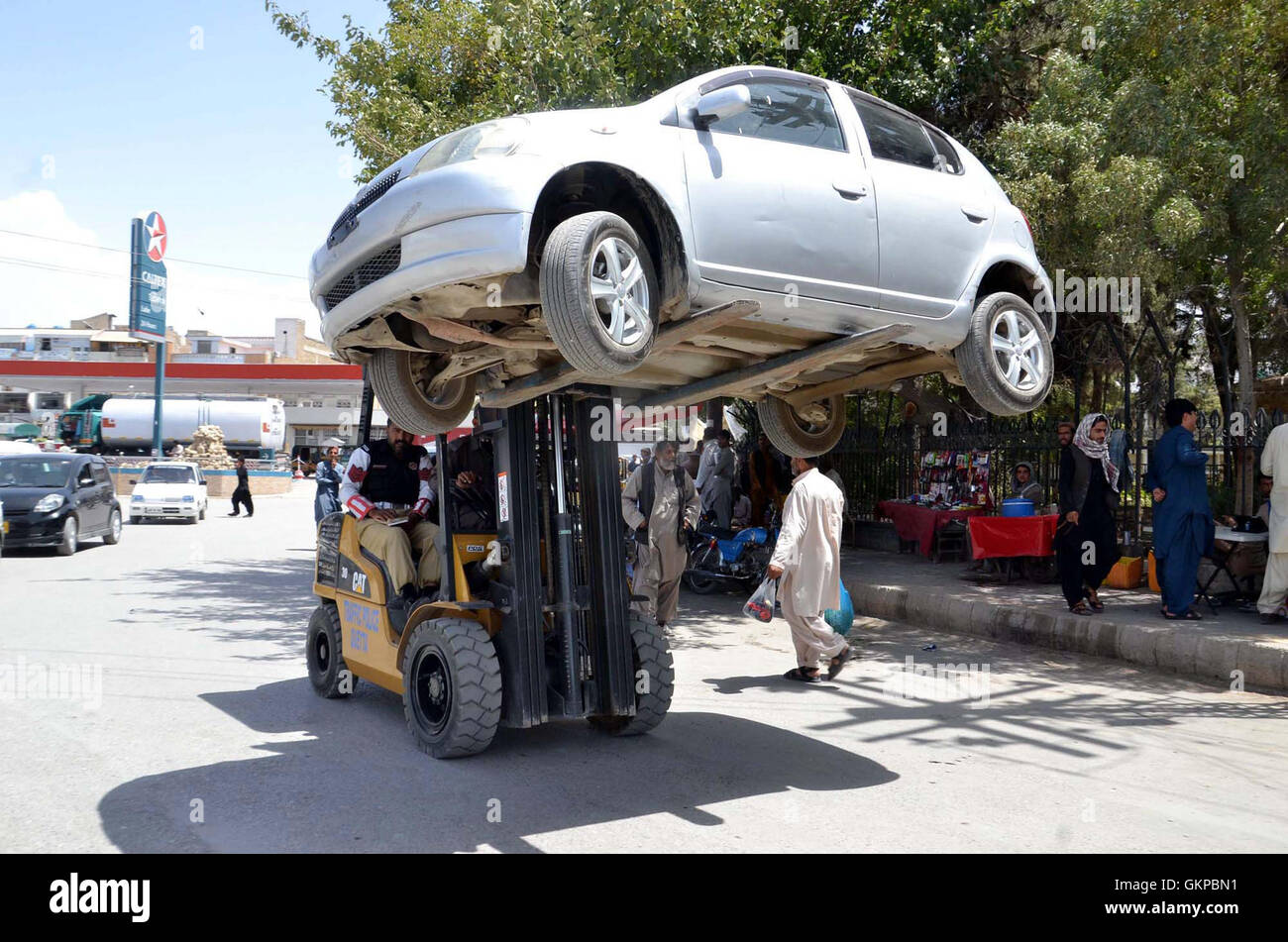 Traffic police car lifter lifts car that parked in no parking area