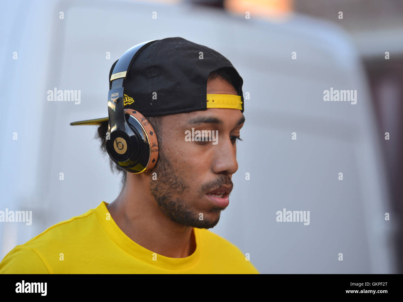 Dortmund's Pierre-Emerick Aubameyang wearing headphones at the DFB Cup 1st  round football match between SV Eintracht Trier and Borussia Dortmund at  the Moselstadion Stadion in Trier, Germany, 22 August 2016. PHOTO: HARALD