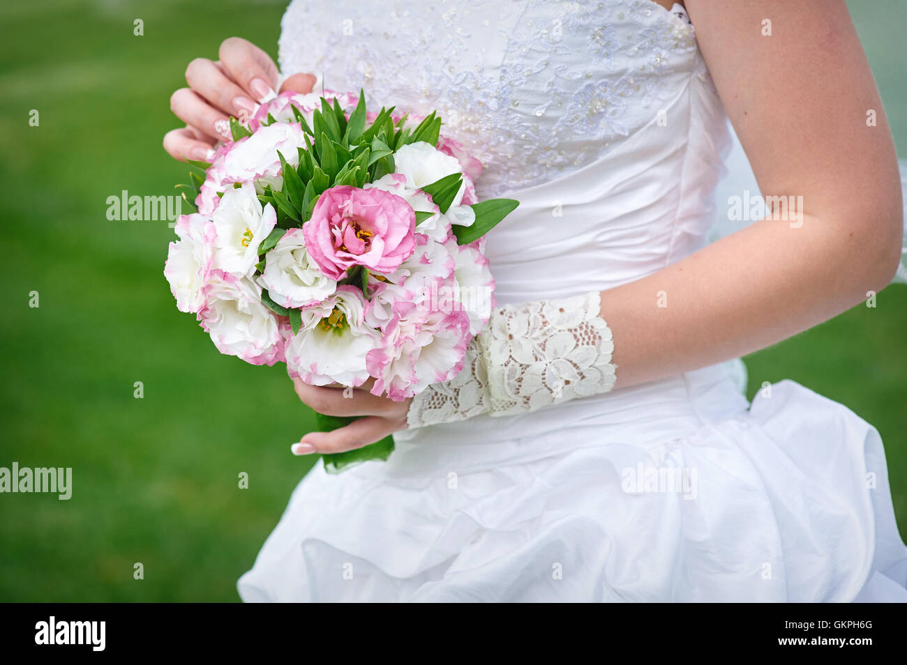 Bride holding beautiful wedding bouquet Stock Photo - Alamy