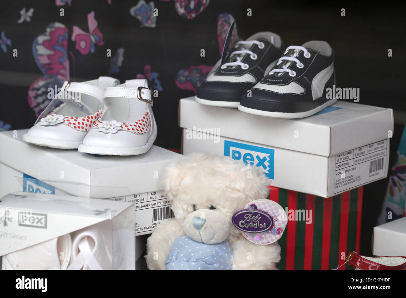 Pex shoes for young children in a shop window Stock Photo - Alamy