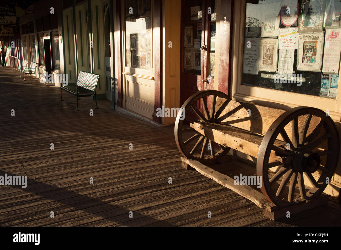 Late afternoon light shines on a wooden walkway in Tombstone, Arizona. Stock Photo