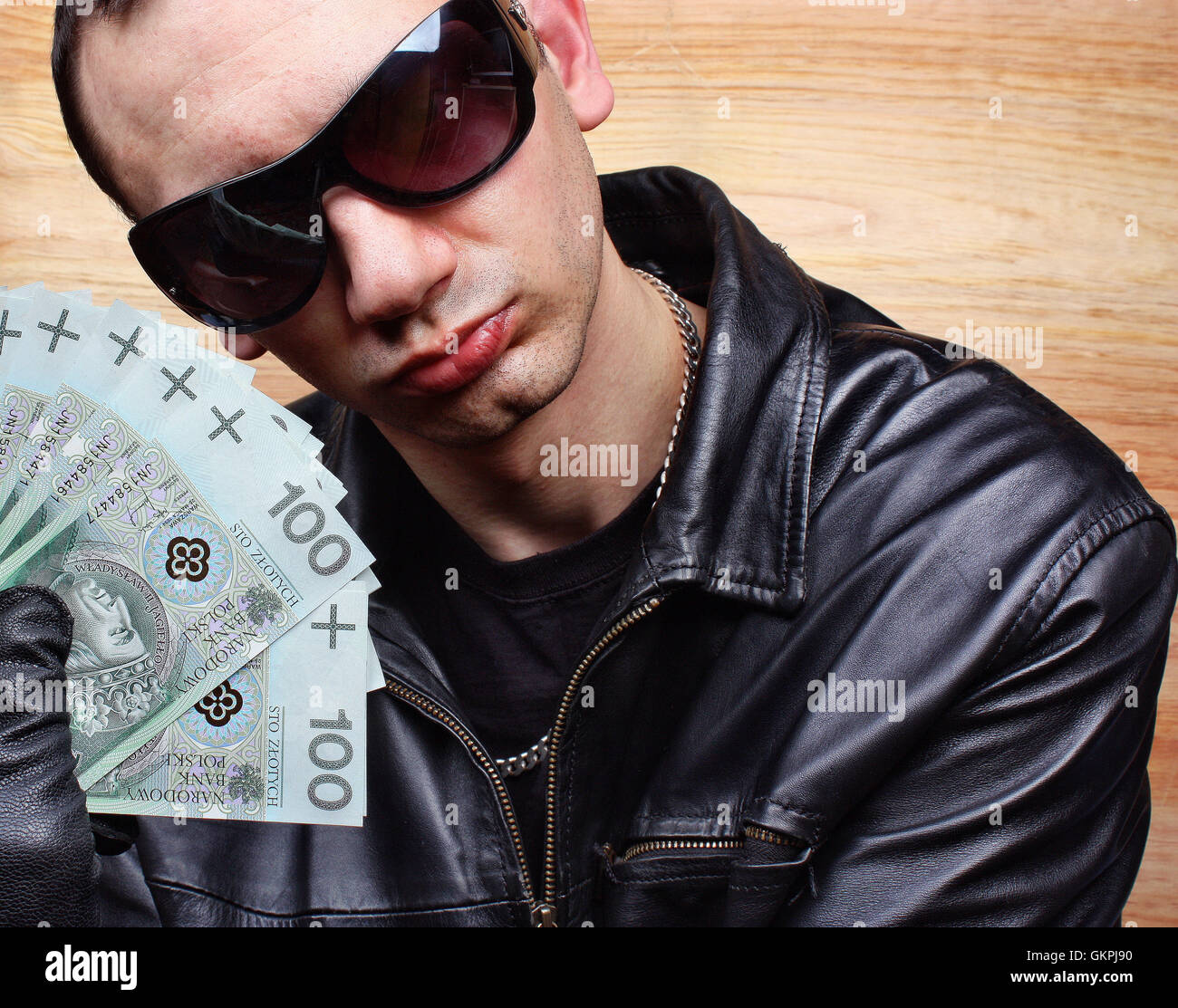 Mafia gangster with a fan polish money Stock Photo Alamy