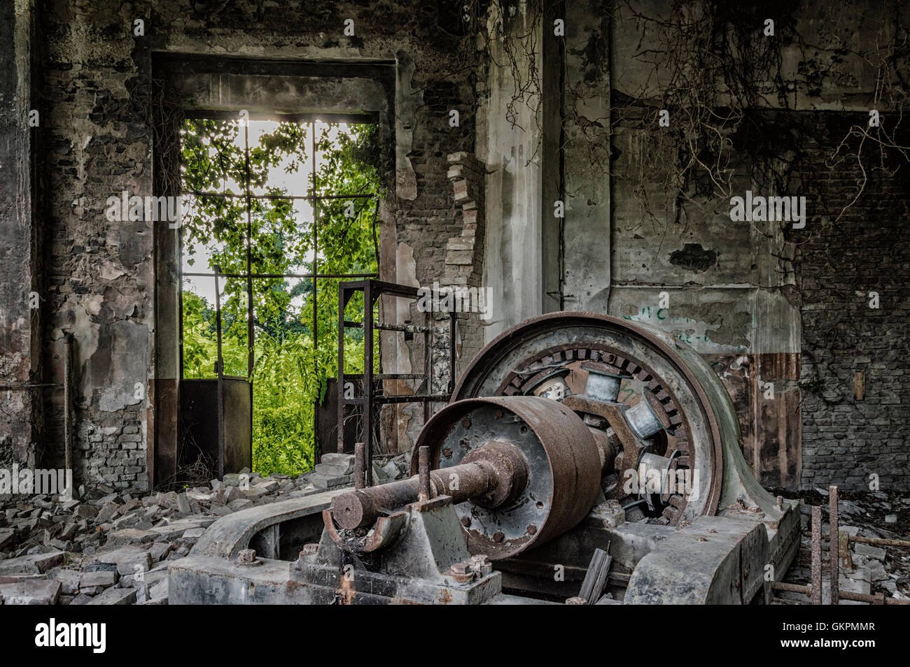Dusty Machinery in abandoned factory ready for demolition Stock Photo