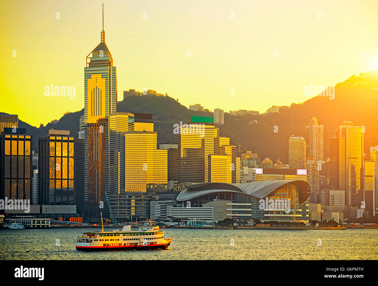 Hong Kong skyline in sunset Stock Photo - Alamy