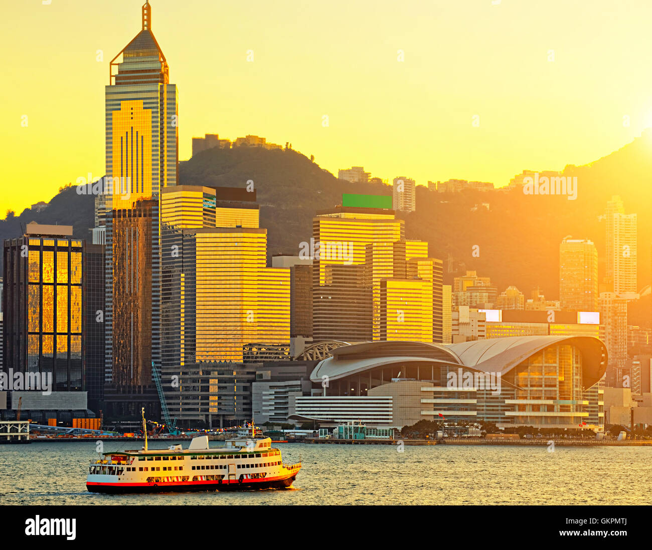 Hong Kong skyline in sunset Stock Photo - Alamy