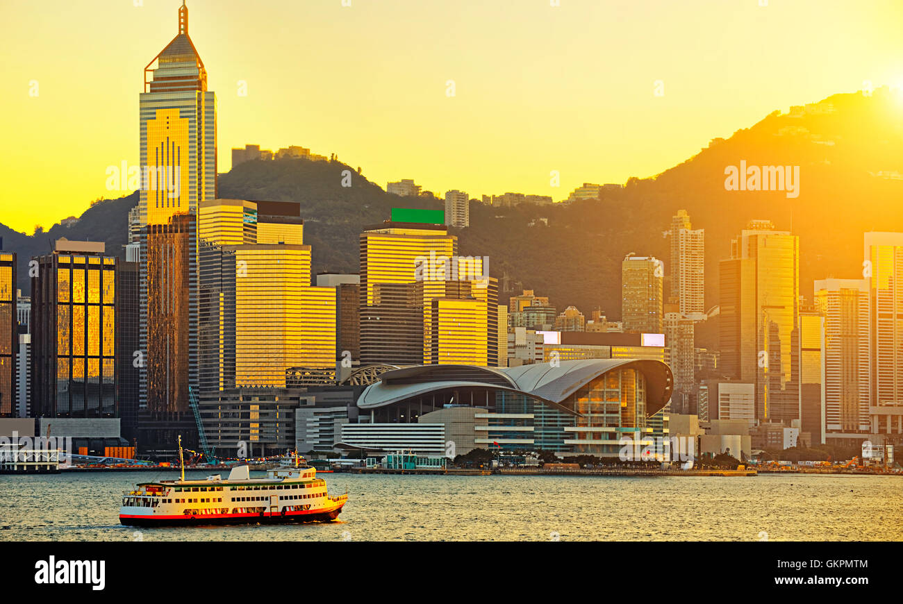 Hong Kong skyline in sunset Stock Photo - Alamy