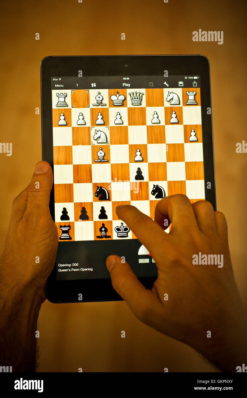 playing a chess game on iPad tablet Stock Photo - Alamy