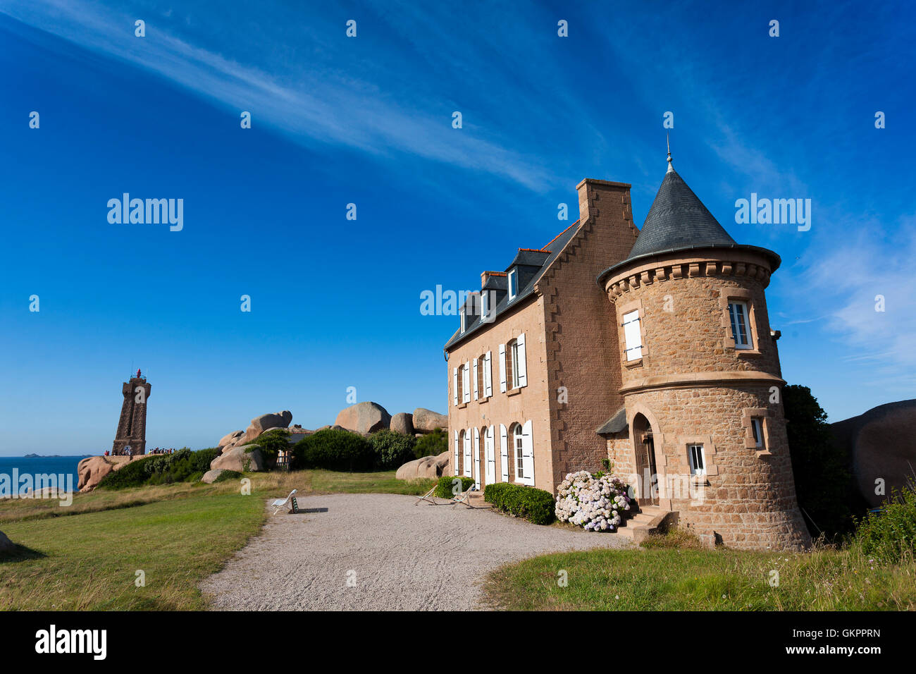 Lighthouse at Cote de Granit Rose, Ploumanach, Brittany, France Stock Photo
