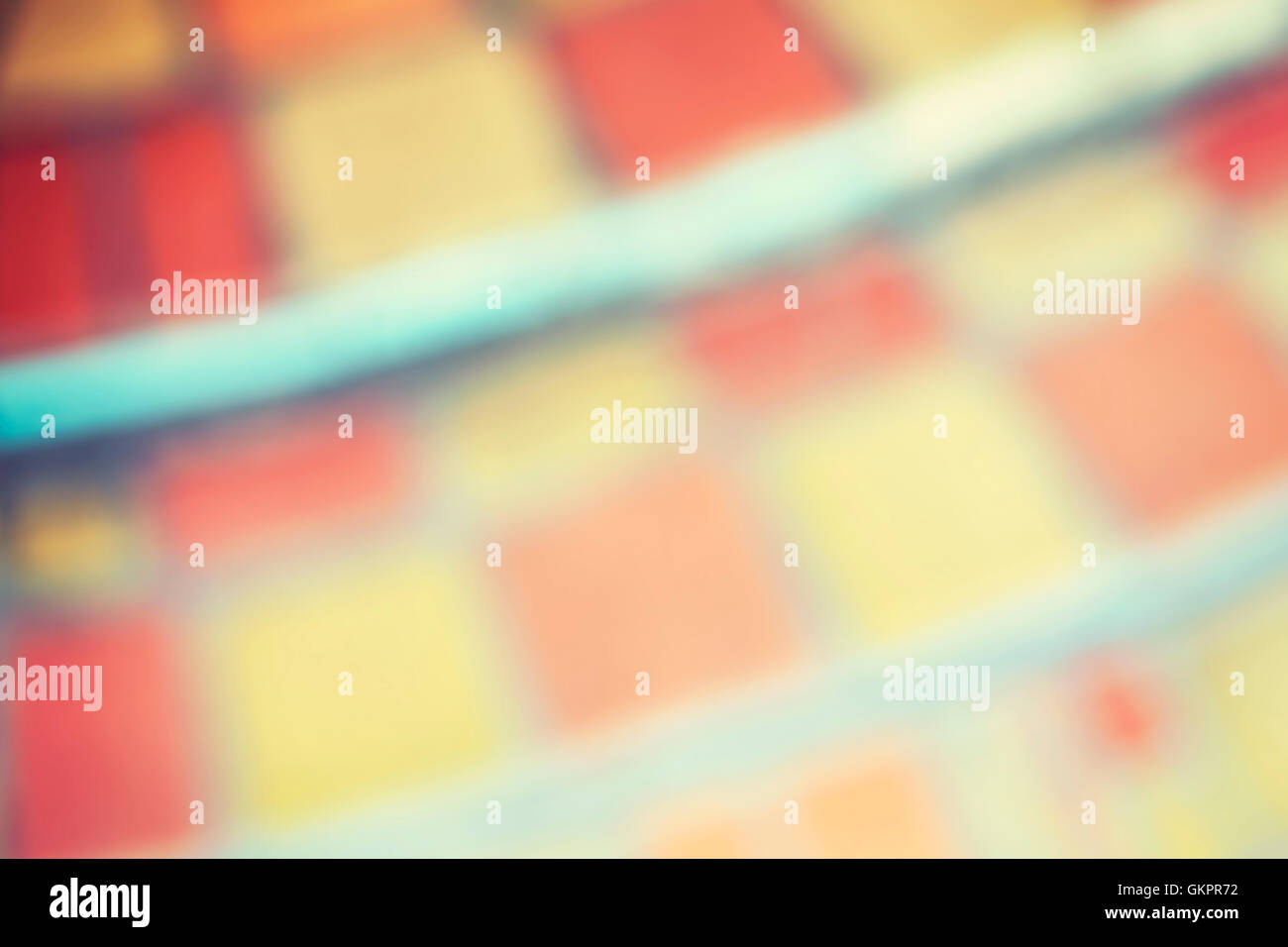 Blurred abstract background made of colorful tiles. Stock Photo