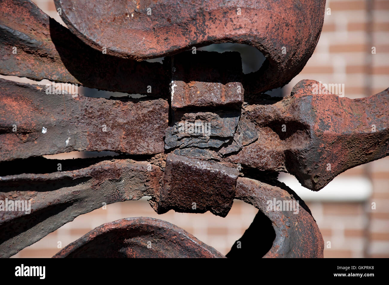 Rusty metal forged element Stock Photo